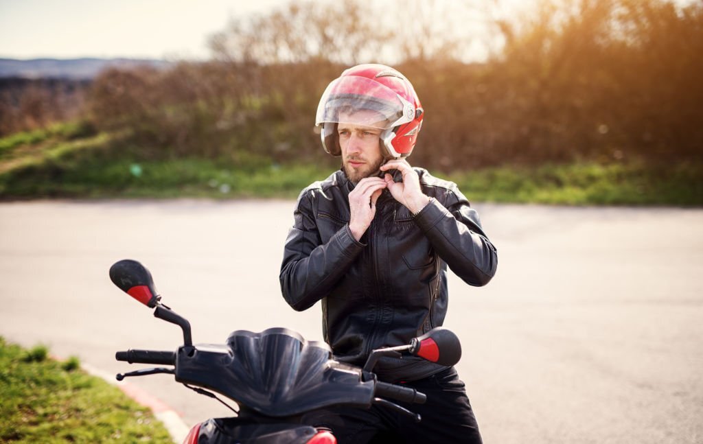 how tight should a motorcycle helmet be